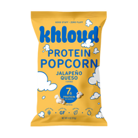 Front of the yellow Khloud Jalapeño Queso Protein Popcorn bag, 4 oz